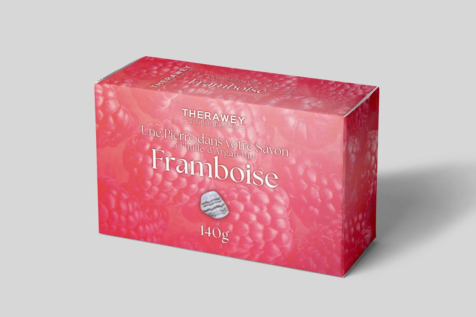 Savon artisanal framboise à l’huile d’argan bio avec pierre naturelle intégrée, 140 g, soin hydratant et fruité pour une peau douce et parfumée.